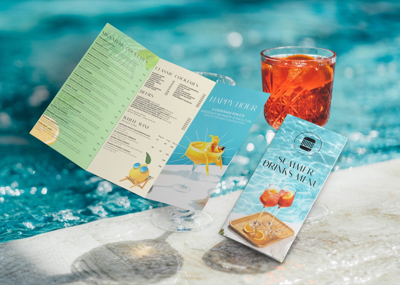 BUNS summer drinks menu design photographed by a pool